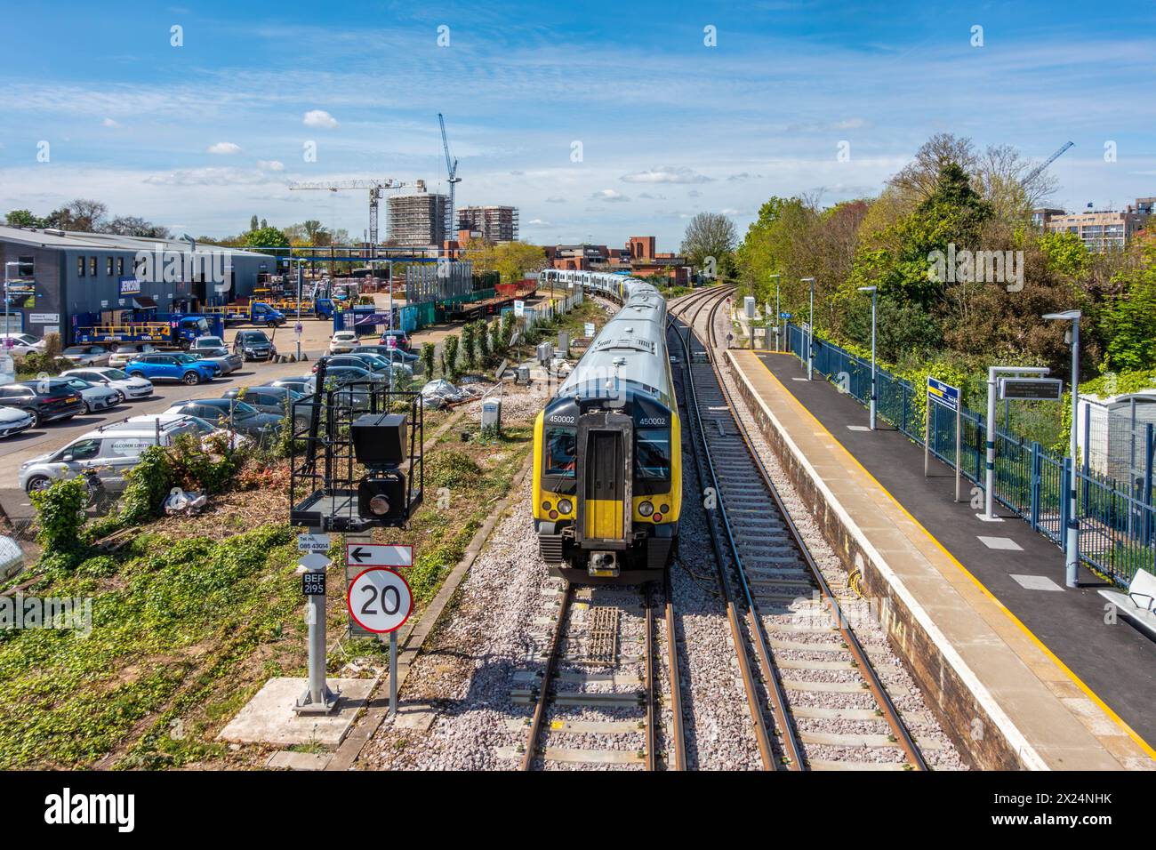 A train departs from the railway station at StainesuponThames in