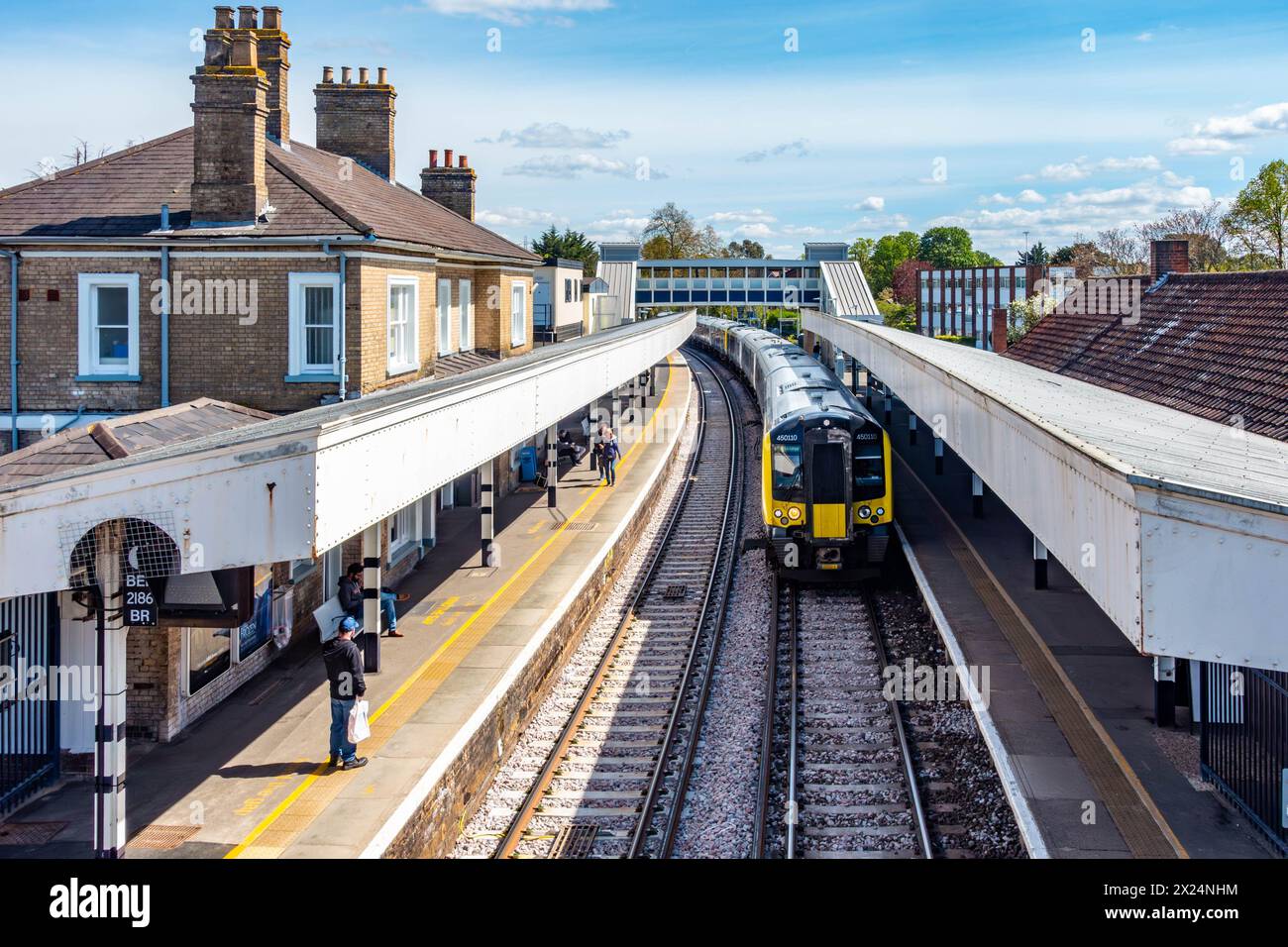 A train waits at the platform at StainesuponThames railway station