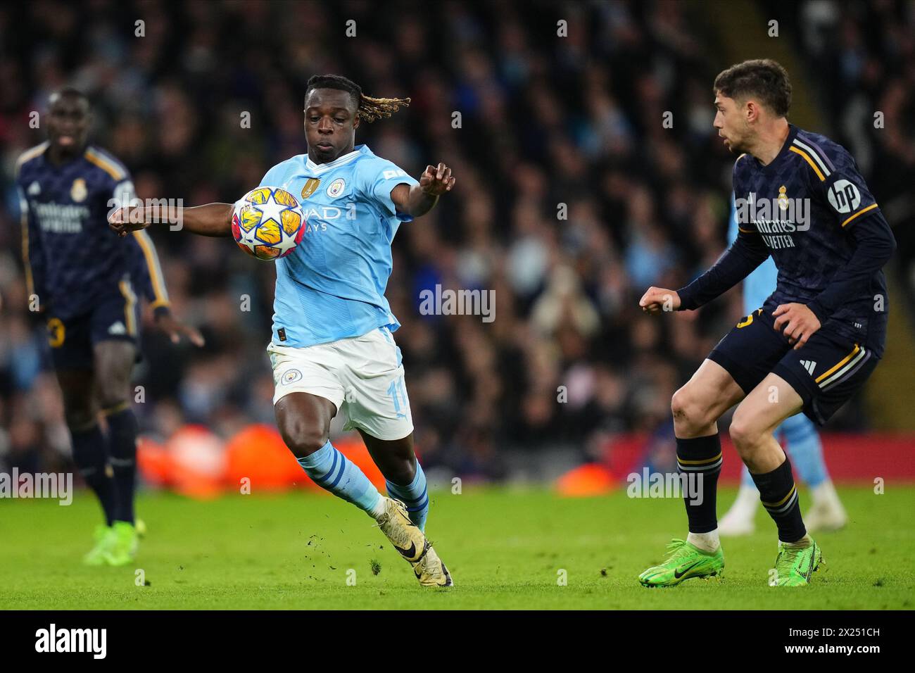 Jeremy Doku of Manchester City during the UEFA Champions League match, Quarter-finals, second leg, between Manchester City and Real Madrid played at Ethiad Stadium on April 17, 2024 in Manchester, England. (Photo by Bagu Blanco / PRESSINPHOTO) Stock Photo