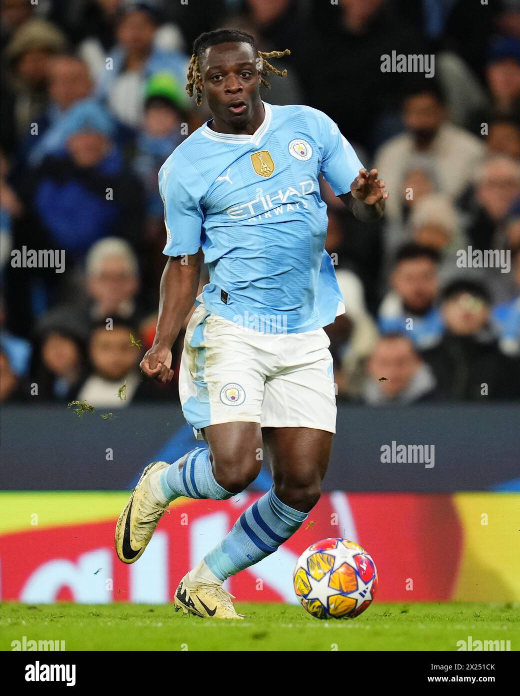 Jeremy Doku of Manchester City during the UEFA Champions League match, Quarter-finals, second leg, between Manchester City and Real Madrid played at Ethiad Stadium on April 17, 2024 in Manchester, England. (Photo by Bagu Blanco / PRESSINPHOTO) Stock Photo