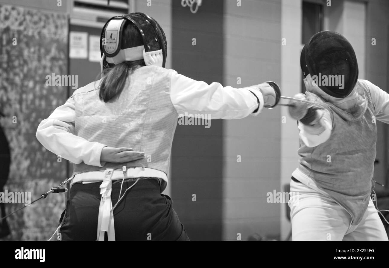 UNITED STATES - 04-19-2024: Out of Nowhere Fencing,  offers instruction in the sport of fencing for all levels under the watchful eye of coach David C Stock Photo