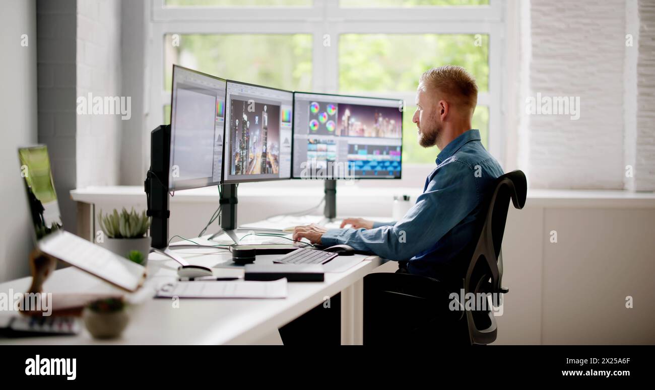 Graphic Web Designer Using Design Editing Software Stock Photo - Alamy