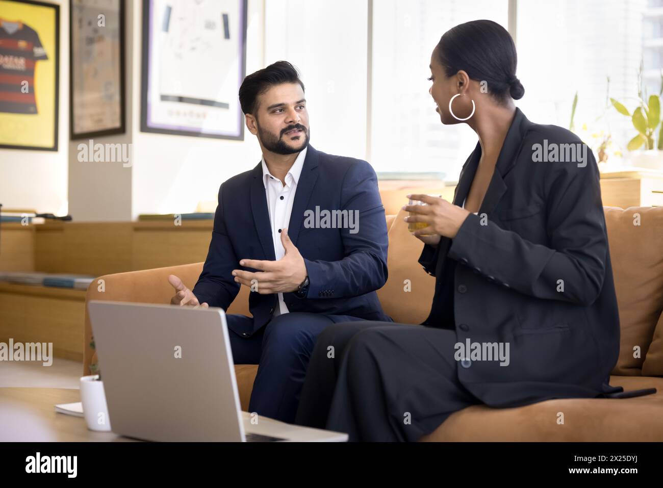 Young couple wearing suits hi-res stock photography and images - Alamy