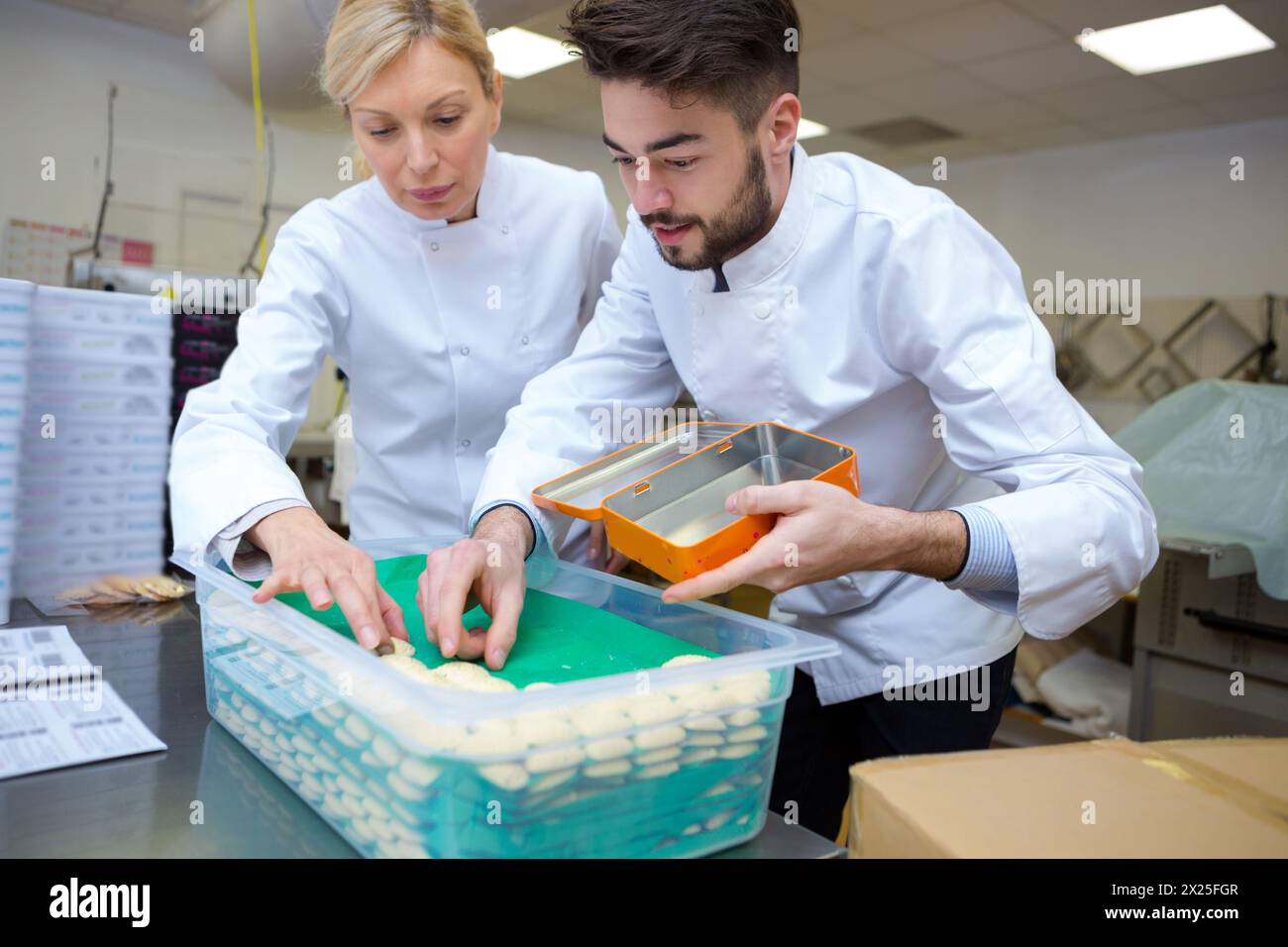 workers in confectionery plant Stock Photo - Alamy