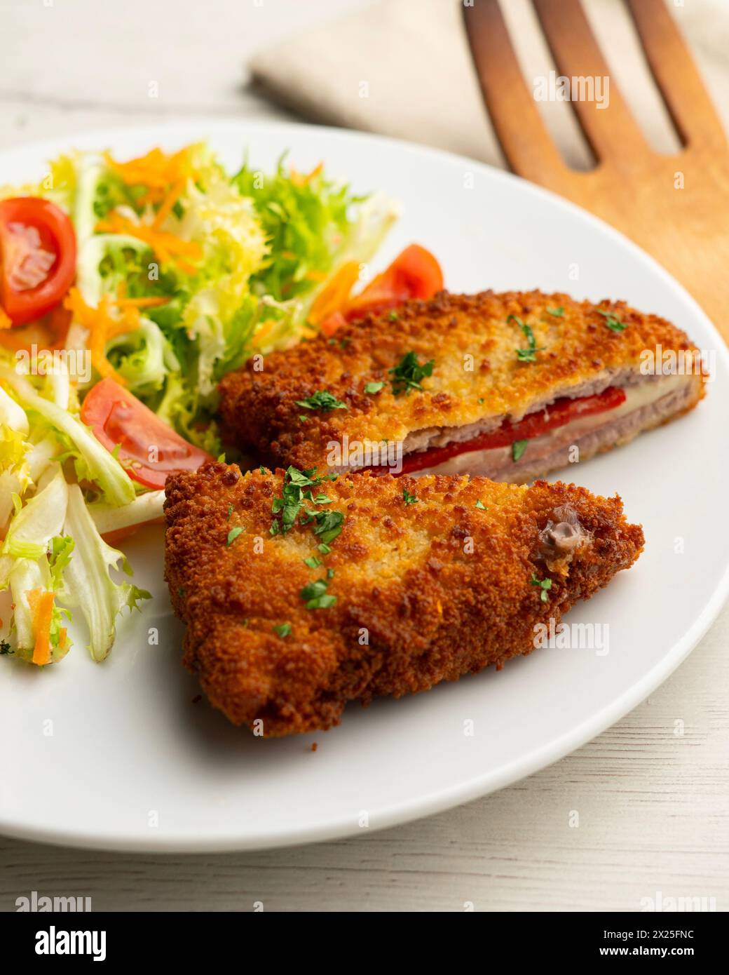 Cachopo is a Spanish dish that consists of two breaded beef fillets