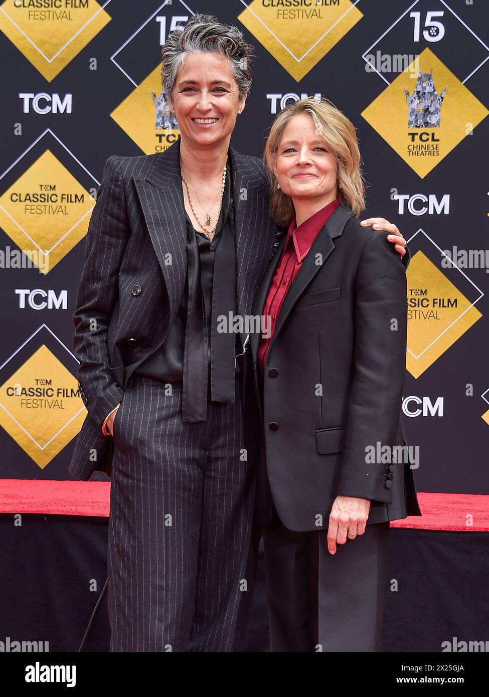 HOLLYWOOD, LOS ANGELES, CALIFORNIA, USA - APRIL 19: Alexandra Hedison and wife Jodie Foster attend the 15th Annual TCM Classic Film Festival 2024 - TCM Hosts Handprint And Footprint Ceremony Honoring Jodie Foster held at the TCL Chinese Theatre IMAX Forecourt on April 19, 2024 in Hollywood, Los Angeles, California, United States. (Photo by Image Press Agency) Credit: Image Press Agency/Alamy Live News Stock Photo