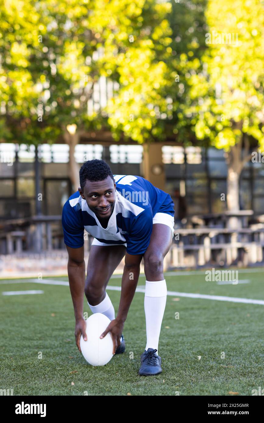 Stretching athlete wearing black hi-res stock photography and images ...