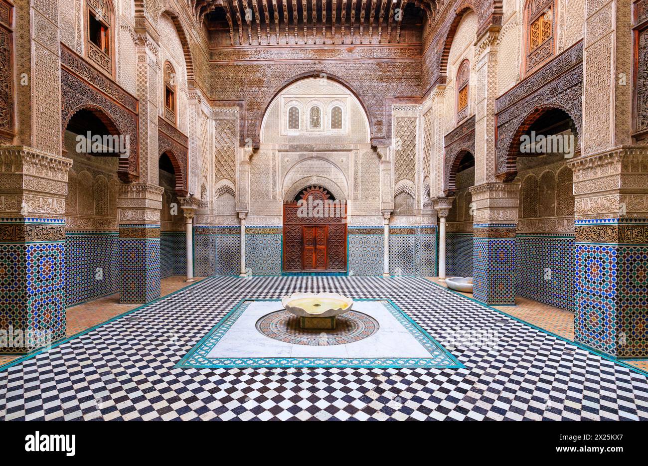 Fez or Fes, Morocco. Courtyard of the Al-Attarine Madrasa. Stock Photo