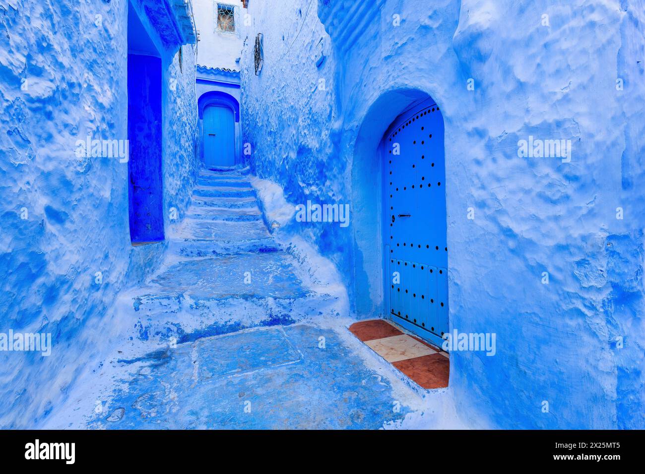 Chefchaouen, Morocco. The old walled city, or medina with its traditional houses painted in blue and white. Stock Photo