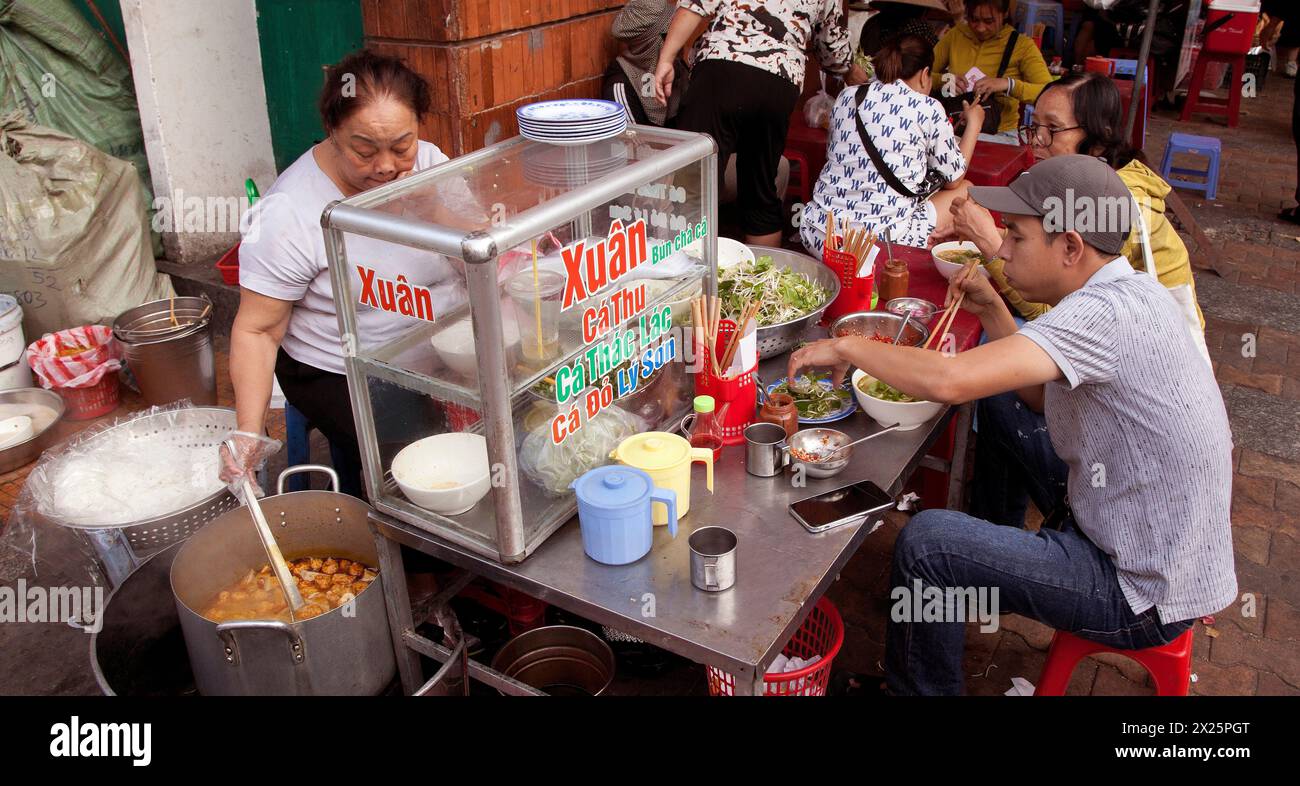 Vietnamese streetfood seller, Hoi an, Vietnam Stock Photo
