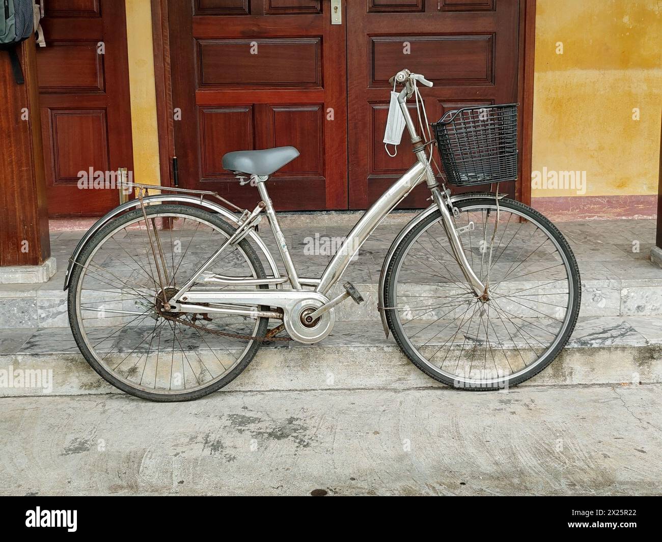 Vietnamese bicycle, silver, ladies bike Stock Photo