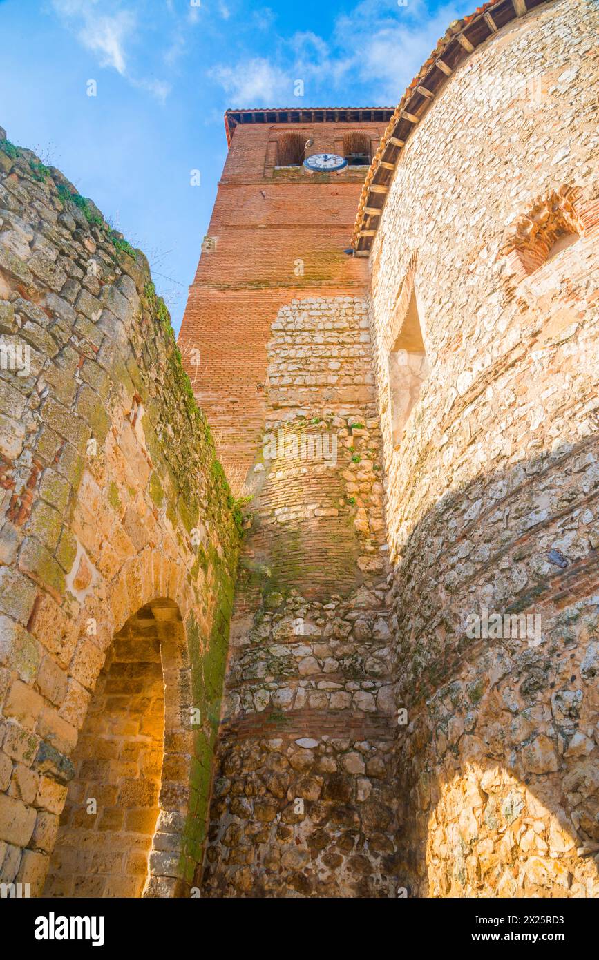 Torremocha castle and tower of San Torcuato church. Santorcaz, Madrid province, Spain. Stock Photo