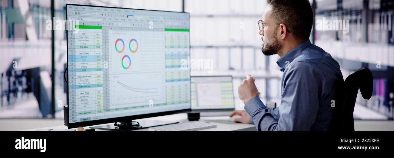 Medical analyst man analyzing data on spreadsheets for accountant Stock Photo