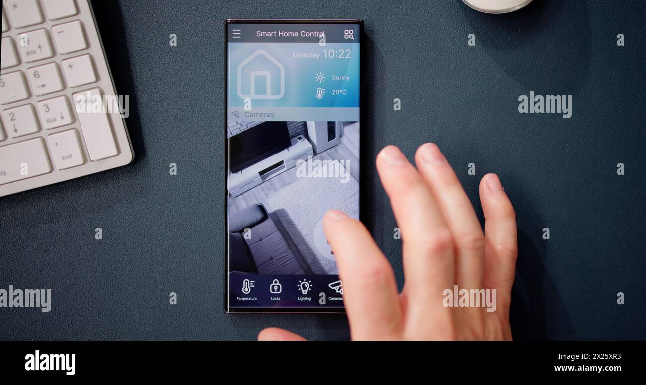 Smart Home CCTV Security On Mobile Phone Or Smartphone Stock Photo
