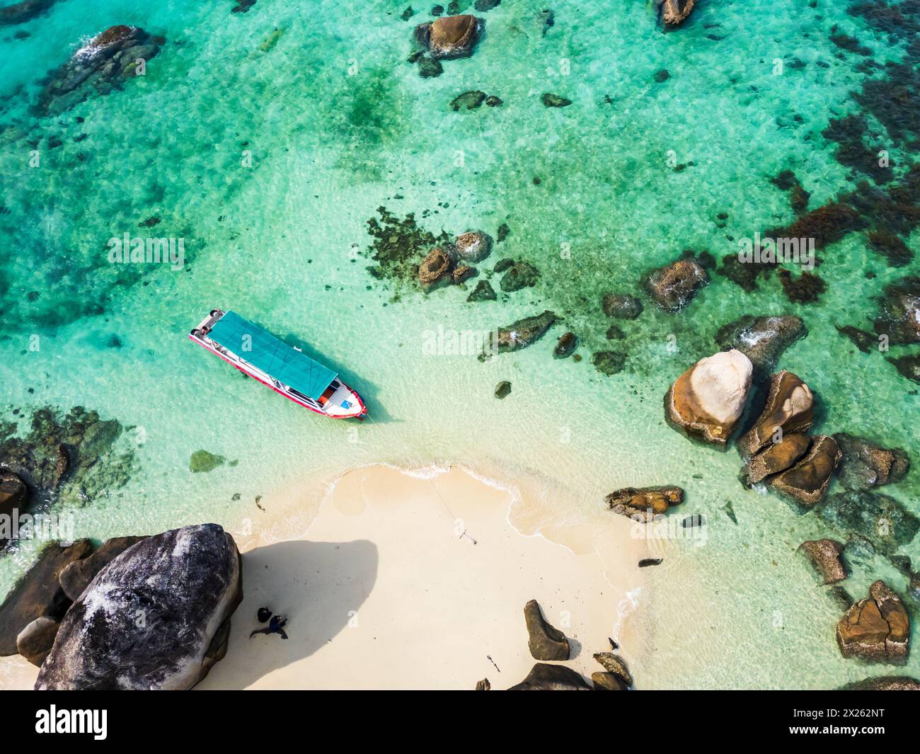 Belitung beach and islands drone view. Beautiful aerial view of islands, boat, sea and rocks in Belitung, Indonesia  Stock Photo