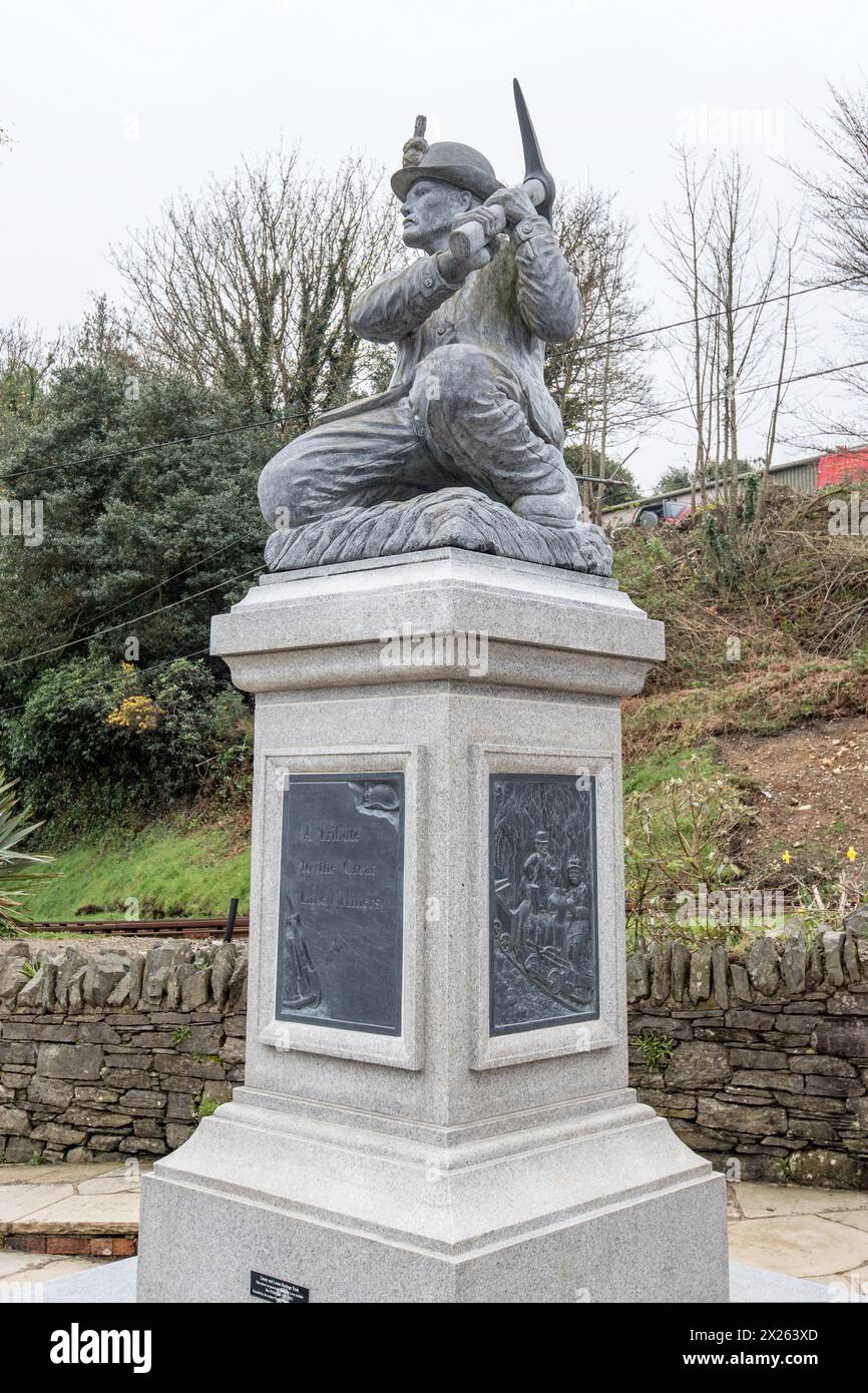Tribute to the Great Laxey Mines a kneeling miner holding a pick axe,Laxey,Laxey isle of Man Stock Photo