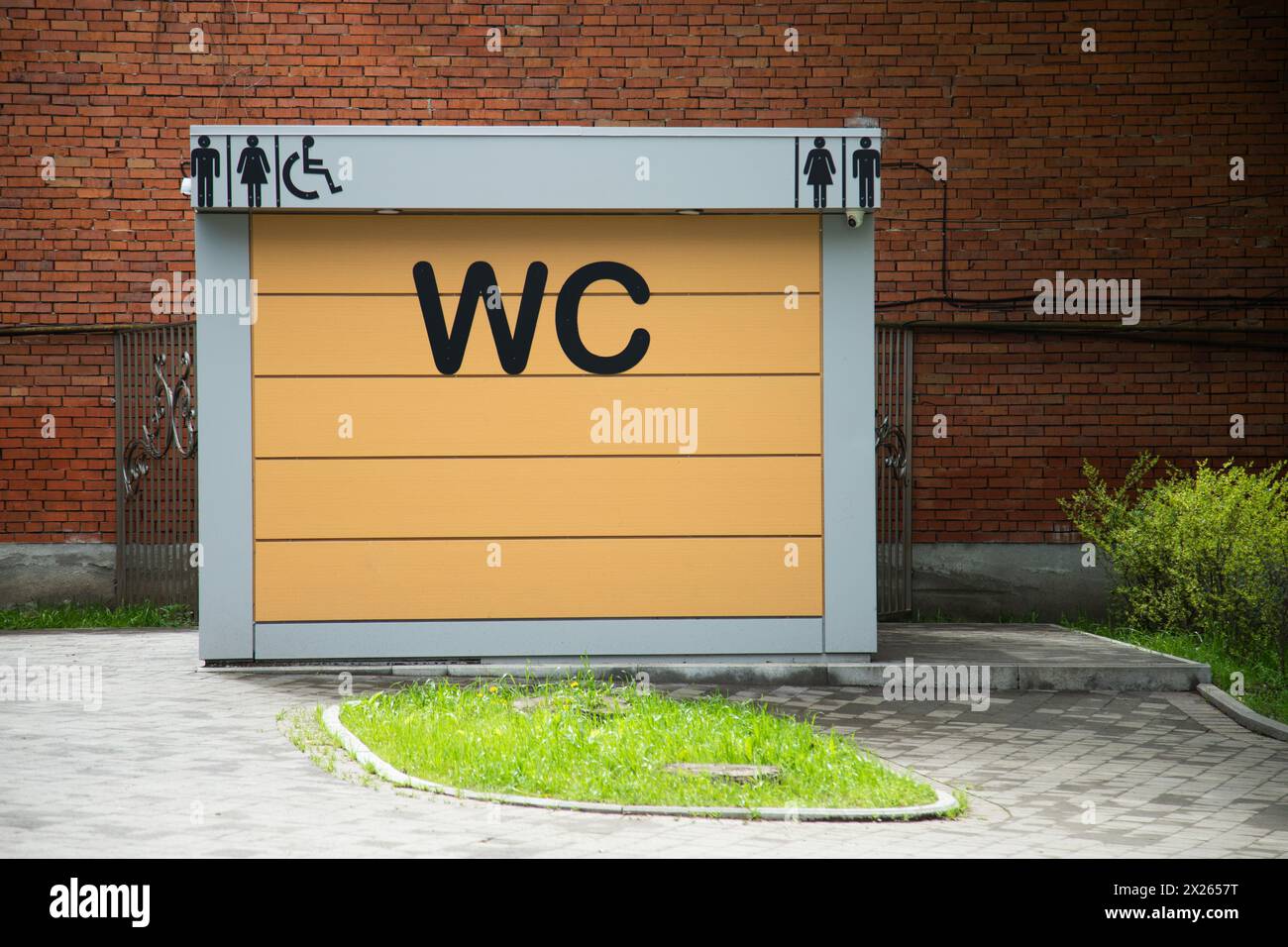 Indicative sign for toilet cubicles for men and women. Outdoor toilet Stock Photo