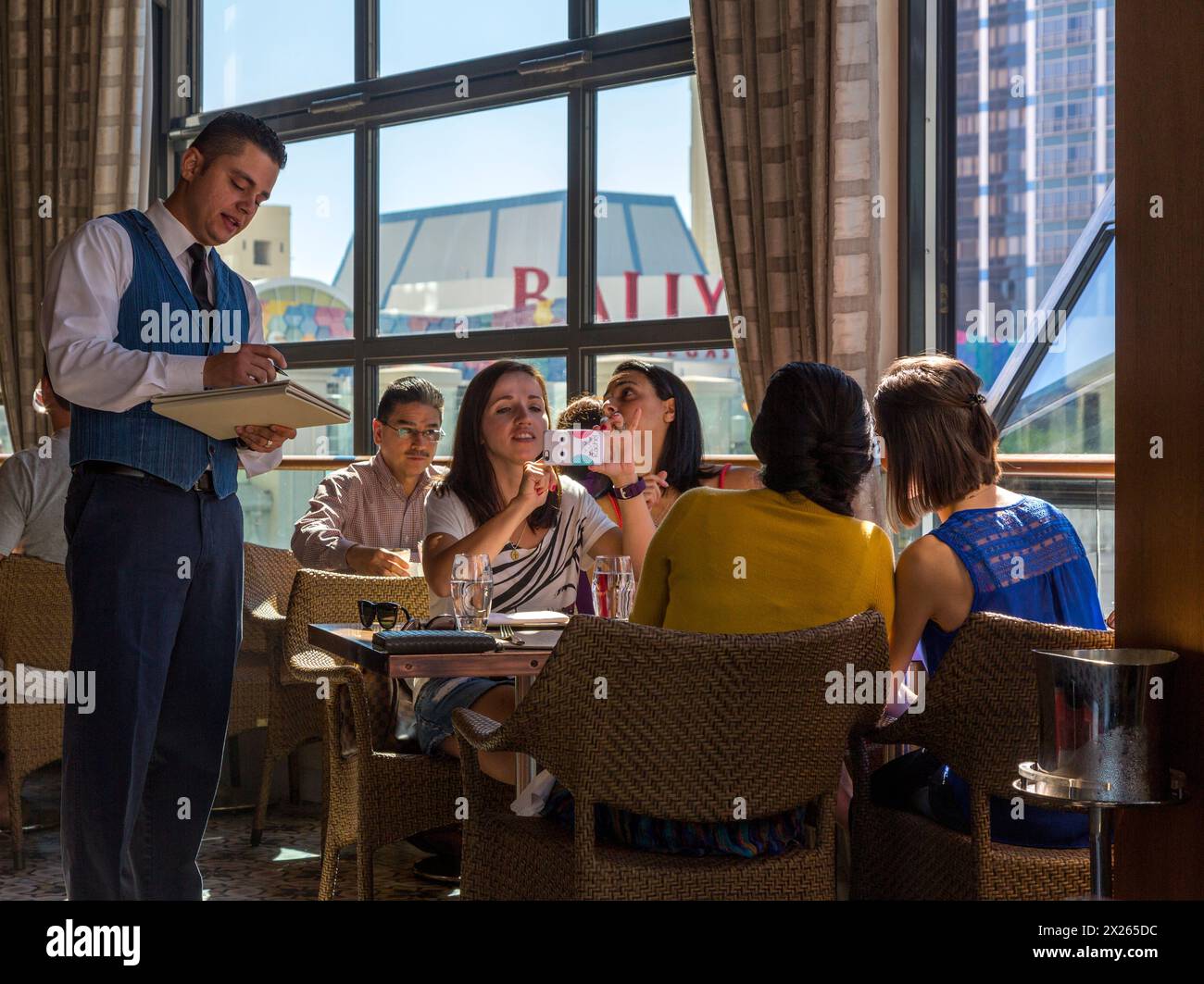 Las Vegas, Nevada.  Patrons Taking a Photo in the Giada Restaurant, The Cromwell Hotel. Stock Photo