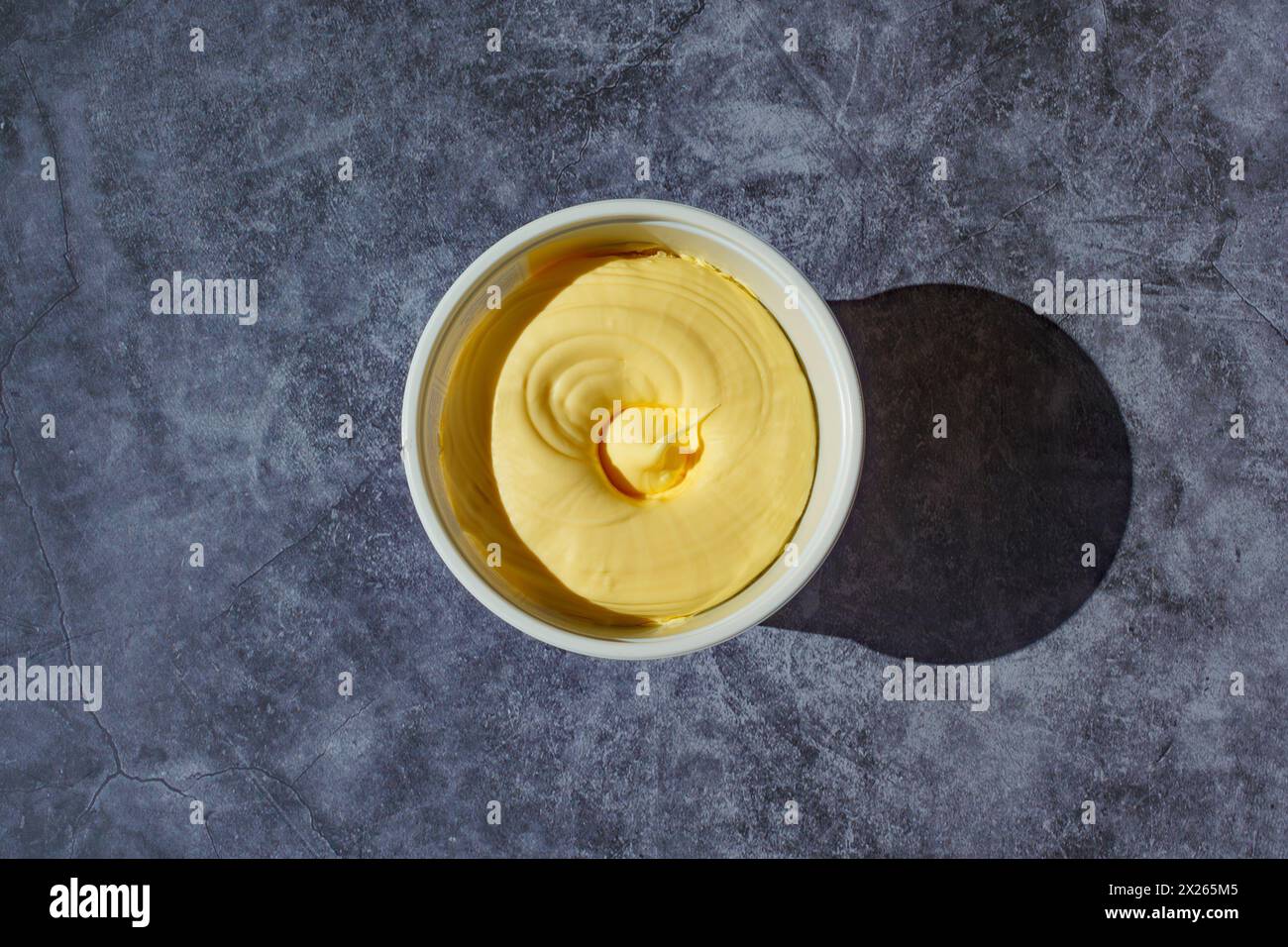Overhead shot of a tub of margarine Stock Photo