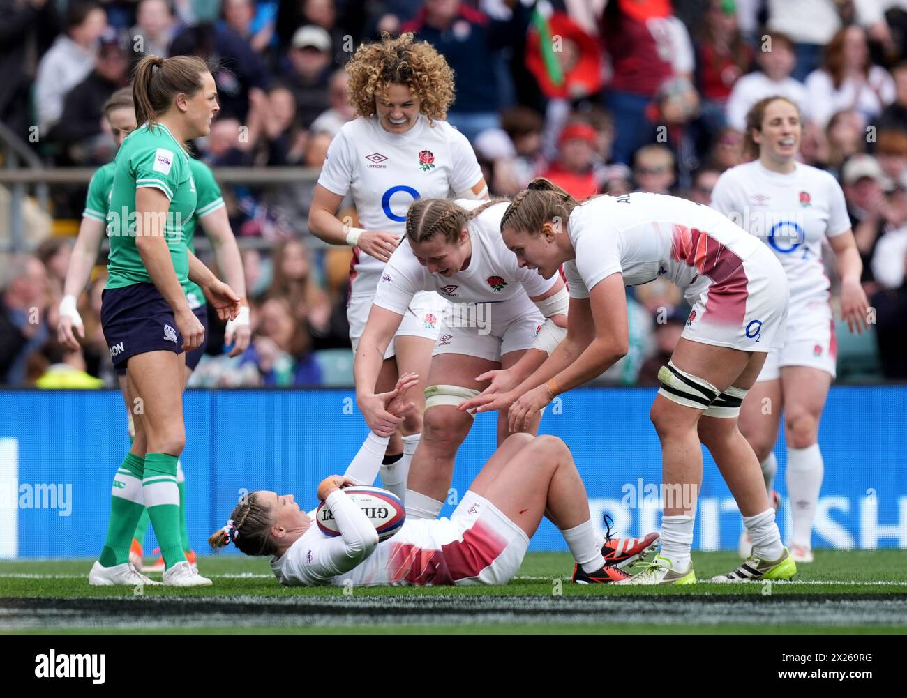 England's Natasha Hunt is congratulated by her team mates after scoring ...