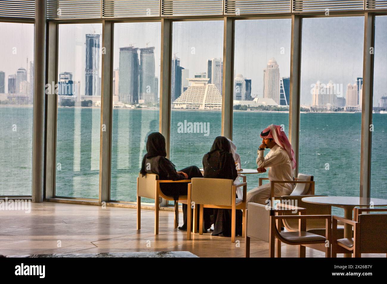 Doha, Qatar.  Watching Doha Grow, through the Windows of the Museum of Islamic Art. Stock Photo