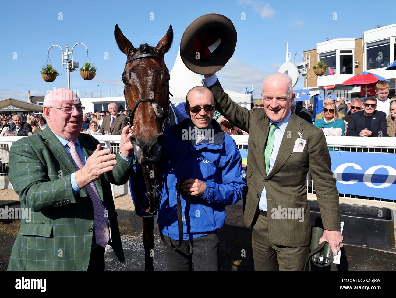 Winning horse Macdermott with trainer Willie Mullins (right) after