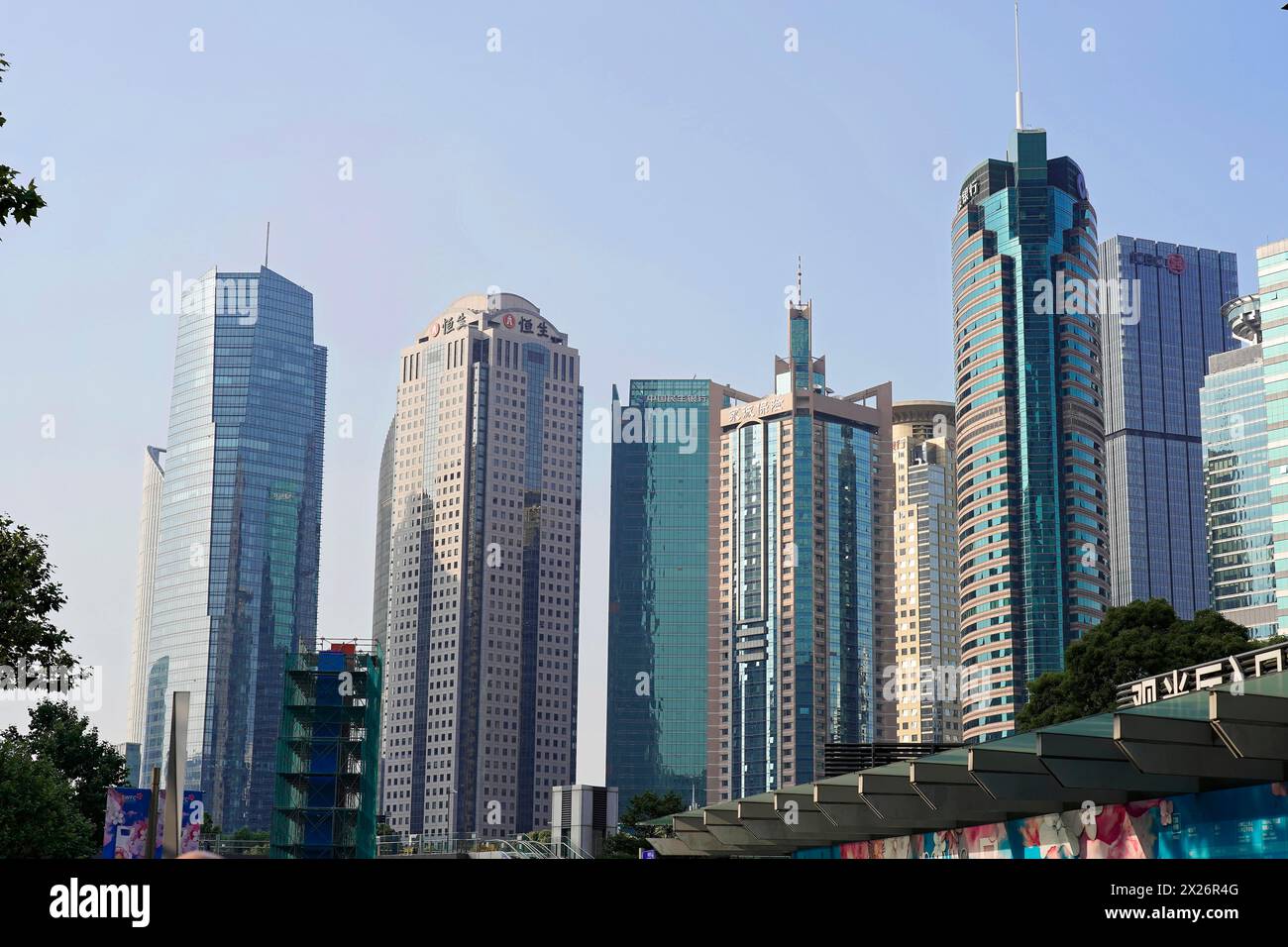 The tallest skyscrapers of the Pudong Special Economic Zone, skyline with several skyscrapers against a clear blue sky, Shanghai, China Stock Photo