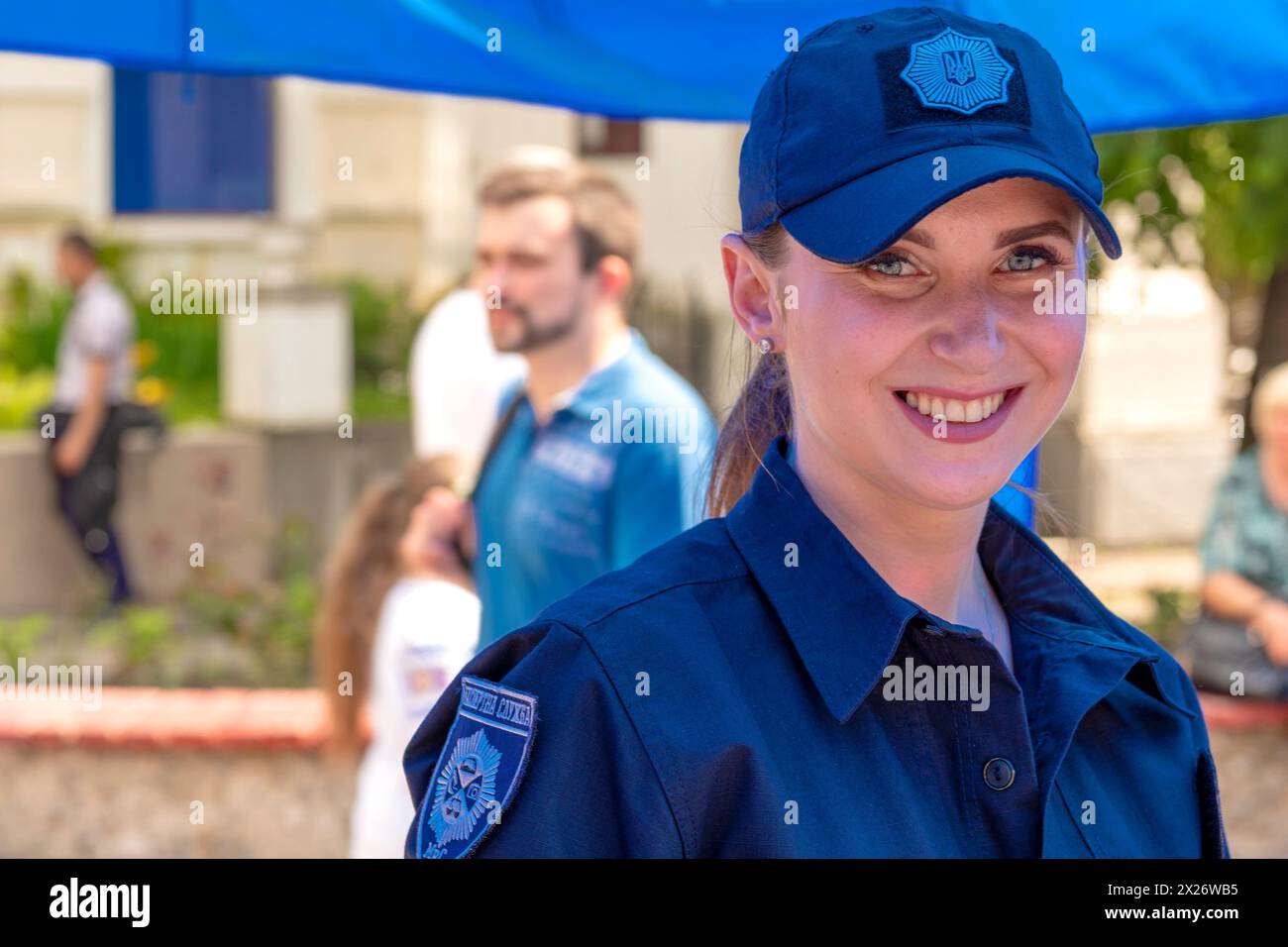 Portrait of the woman of the policeman. The police officer against the background of citizens.Vynnytsa. Ukraine. 09.15.2018. Stock Photo