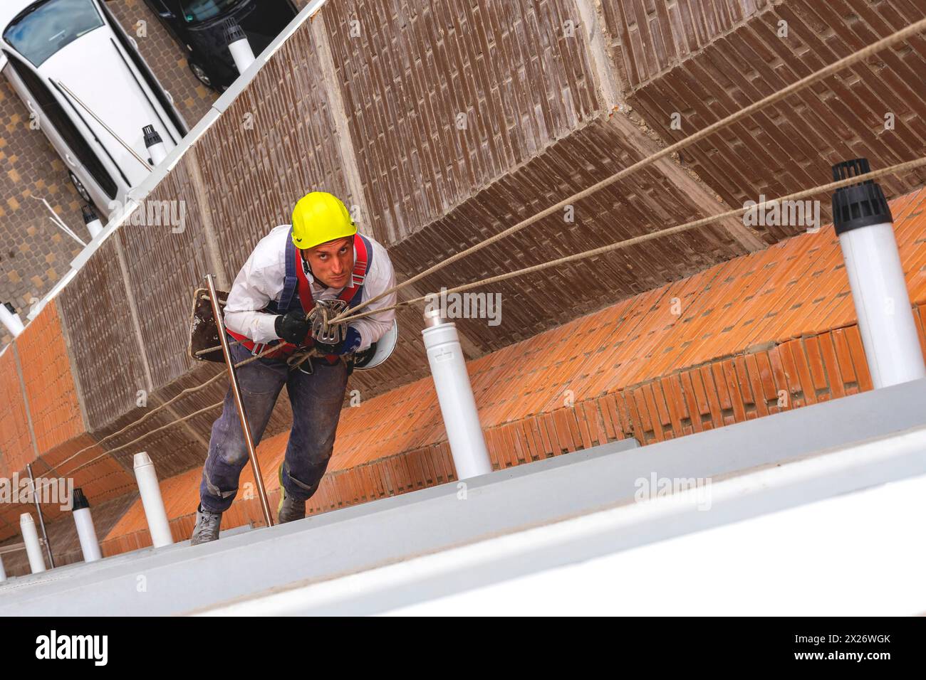 Highaltitude worker. Industrial climber.Highrise works. Rockclimber