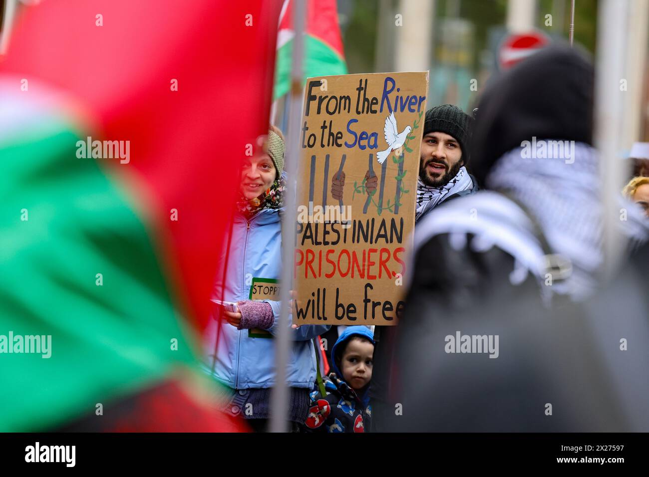 Bonn, Germany. 20th Apr, 2024. A sign reading 'From the Rivern to the Sea Palestinian Prisoners will be free' is displayed at a rally and demonstration on the topic 'Stop the genocide in Gaza! Freedom for all prisoners'. Credit: Christoph Reichwein/dpa/Alamy Live News Stock Photo