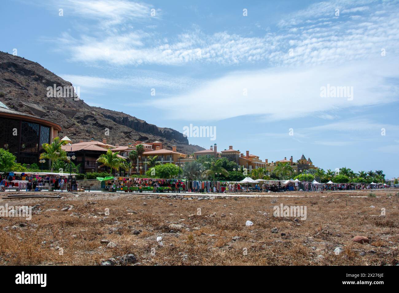 Large Friday market in the streets of the Spanish town of Puerto de Mogán, on the Canary Island of Gran Canaria in Spain Stock Photo