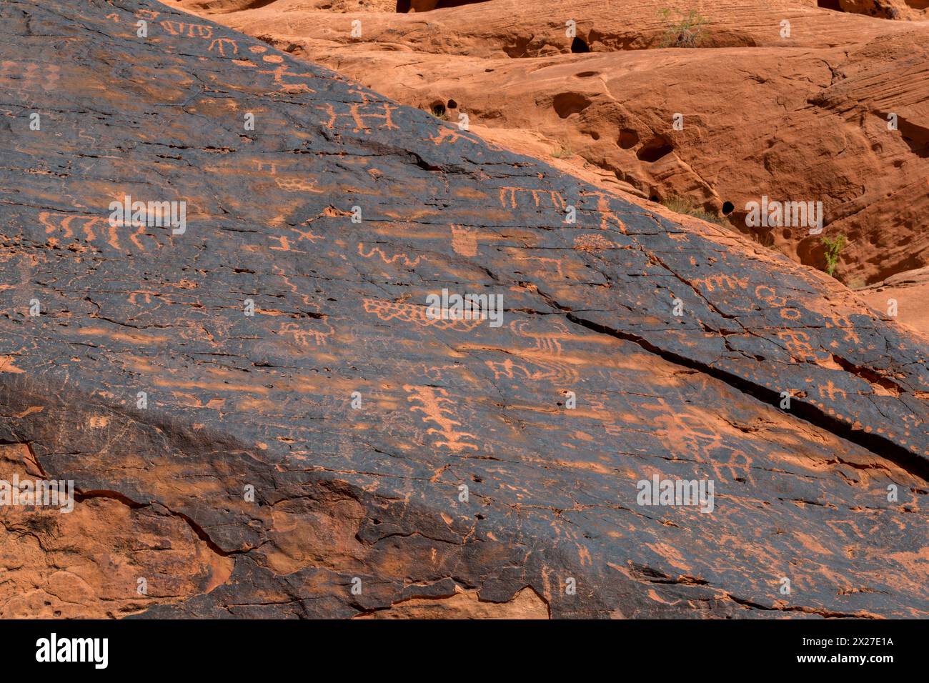 Valley of Fire, Nevada.  Indian Petroglyphs on Desert Varnish, Mouse's Tank Trail. Stock Photo