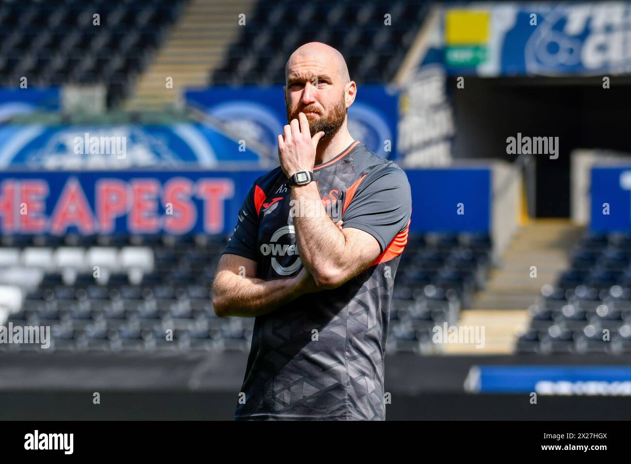 Swansea, Wales. 20 April 2024. Alun Andrews Swansea City Academy Physical Development Coach looks up to the stand at half time during the Under 21 Professional Development League match between Swansea City and Bristol City at the Swansea.com Stadium in Swansea, Wales, UK on 20 April 2024. Credit: Duncan Thomas/Majestic Media/Alamy Live News. Stock Photo