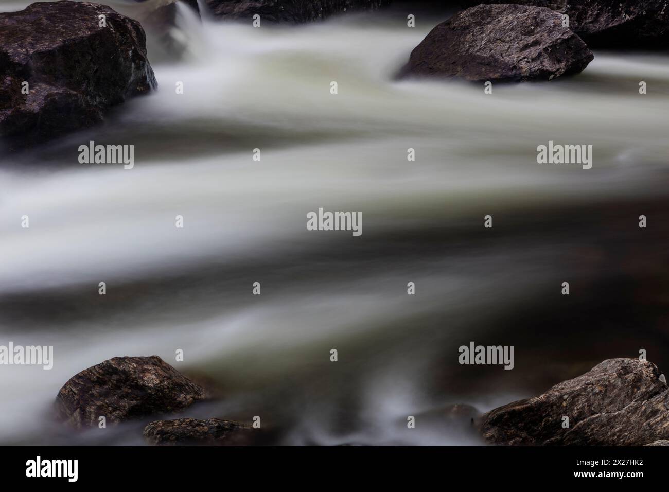 Large boulders and streaming water in Rauma river, Romsdalen valley ...