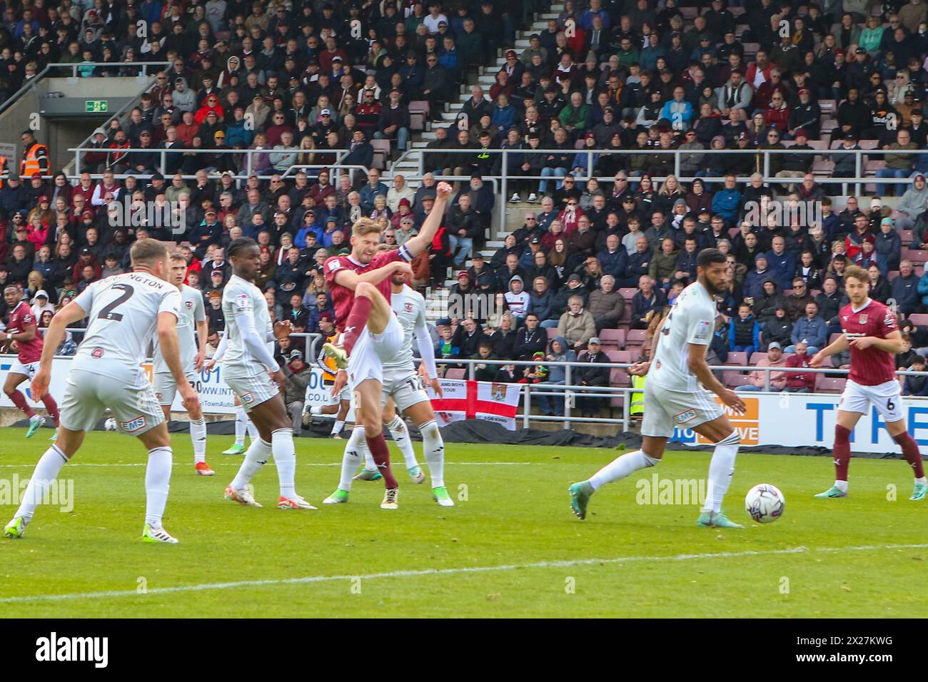 Northampton 20 April 2022:Northampton Town's Jon Guthrie shoots and scores Northampton's equalising goal in the EFL Division 1 Northampton Town v Exeter City Credit: Clive Stapleton/Alamy Live News Stock Photo