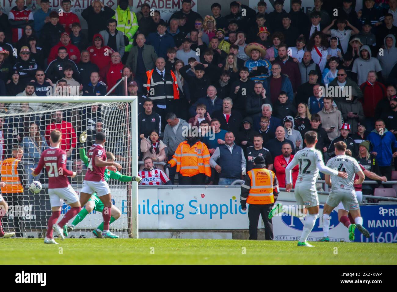 Northampton 20 April 2022:Exeter City's Will Aimson fires past Northampton Town goal keeper Lee Burge to score Exeter second and match winning goal in the EFL Division 1 Northampton Town v Exeter City Credit: Clive Stapleton/Alamy Live News Stock Photo