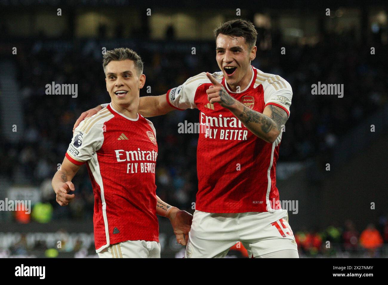 Molineux, Wolverhampton on Saturday 20th April 2024. Leandro Trossard of Arsenal (L) and Jakub Kiwior of Arsenal celebrate after scoring his team's first goal during the Premier League match between Wolverhampton Wanderers and Arsenal at Molineux, Wolverhampton on Saturday 20th April 2024. (Photo: Gustavo Pantano | MI News) Credit: MI News & Sport /Alamy Live News Stock Photo
