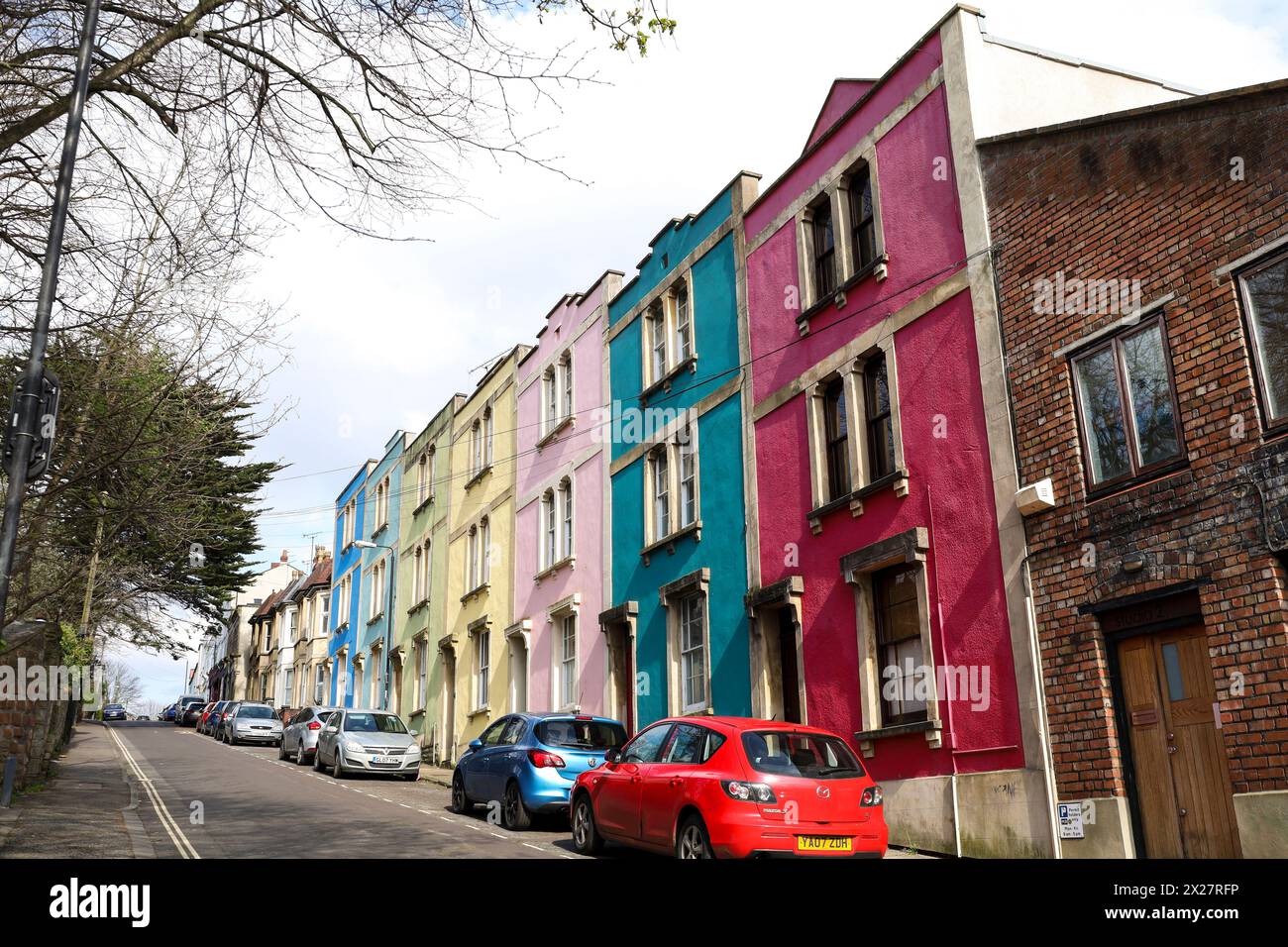 Bristol, England- March 30, 2024: Narrow street with colorful houses in Eastville neighborhood in Bristol city Stock Photo