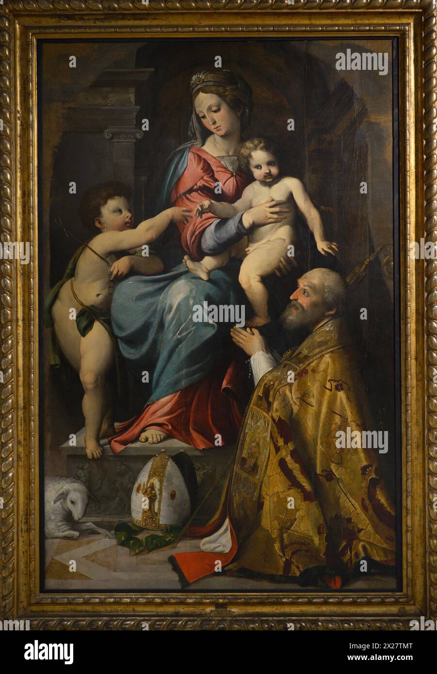 Altobello Melone (1491-ca. 1547). Italian painter. Virgin with Child, the Infant Saint John and Saint Nicholas of Bary. Oil on canvas. Ala Ponzone Civic Museum. Cremona. Italy. Stock Photo