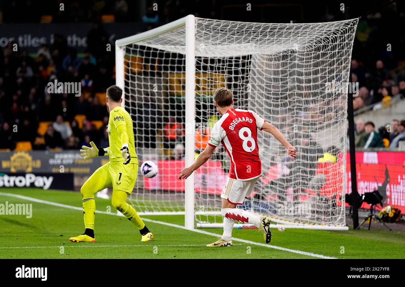 Arsenal's Martin Odegaard scores their side's second goal of the game during the Premier League match at Molineux Stadium, Wolverhampton. Picture date: Saturday April 20, 2024. Stock Photo