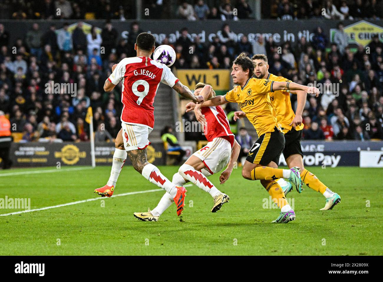 Wolverhampton, West Midlands, UK. 20th April 2024; Molineux Stadium, Wolverhampton, West Midlands, England; Premier League Football, Wolverhampton Wanderers versus Arsenal; Gabriel Jesus of Arsenal controls the ball with his shoulder in front of Hugo Bueno of Wolves Credit: Action Plus Sports Images/Alamy Live News Stock Photo