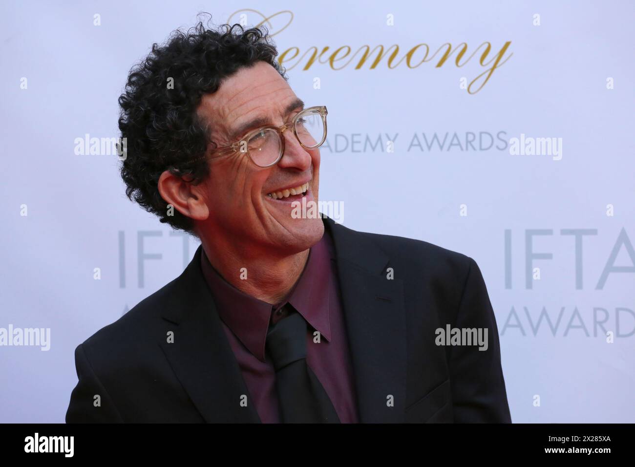 Dublin, Ireland. 20th April 2024.  Cinematographer Robbie Ryan, winner of the award for Cinematography for the film Poor Things, arriving on the red carpet at the Irish Film and Television Awards (IFTA), Dublin Royal Convention Centre. Credit: Doreen Kennedy/Alamy Live News. Stock Photo