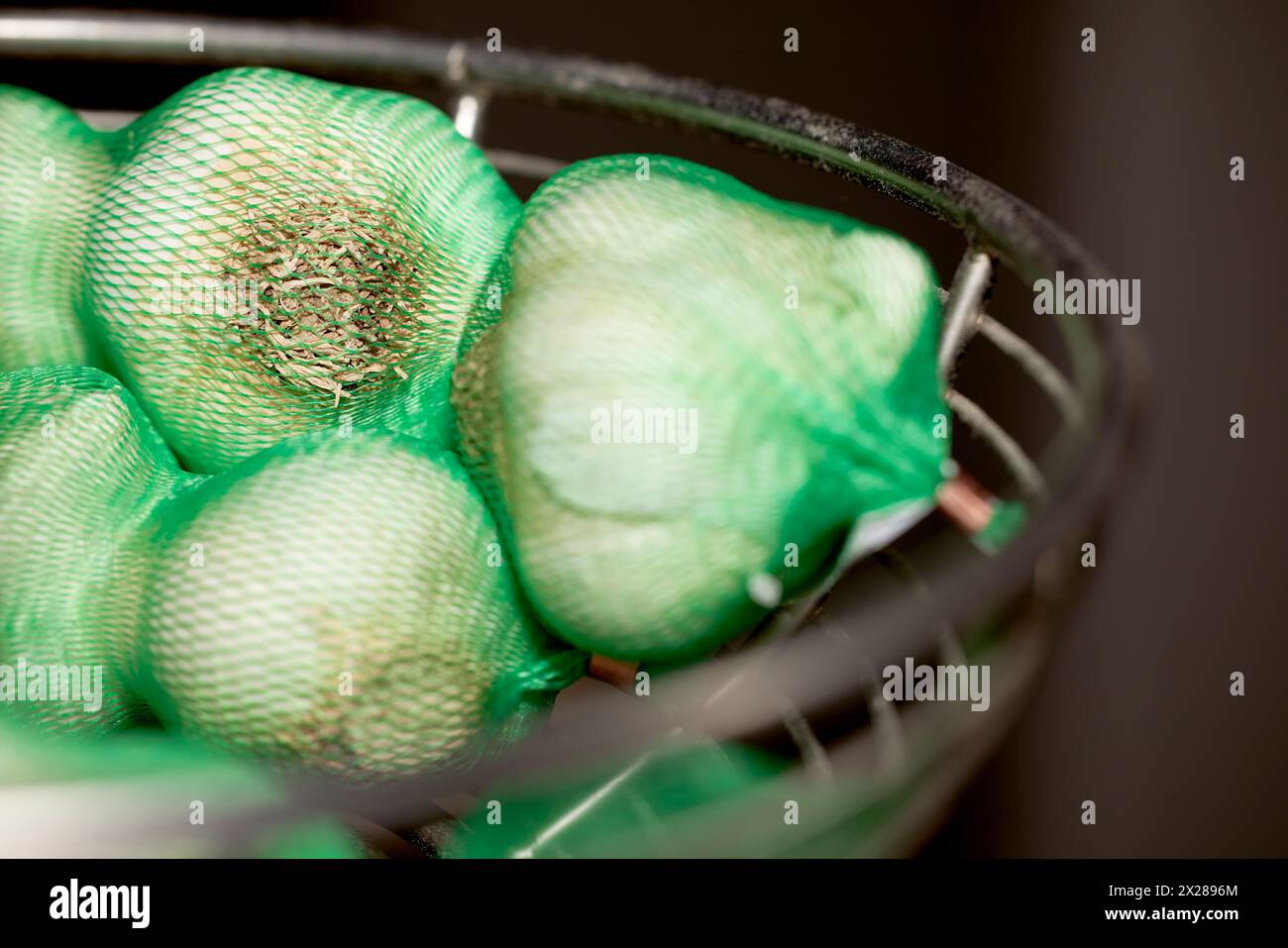 Garlic in net hi-res stock photography and images - Alamy