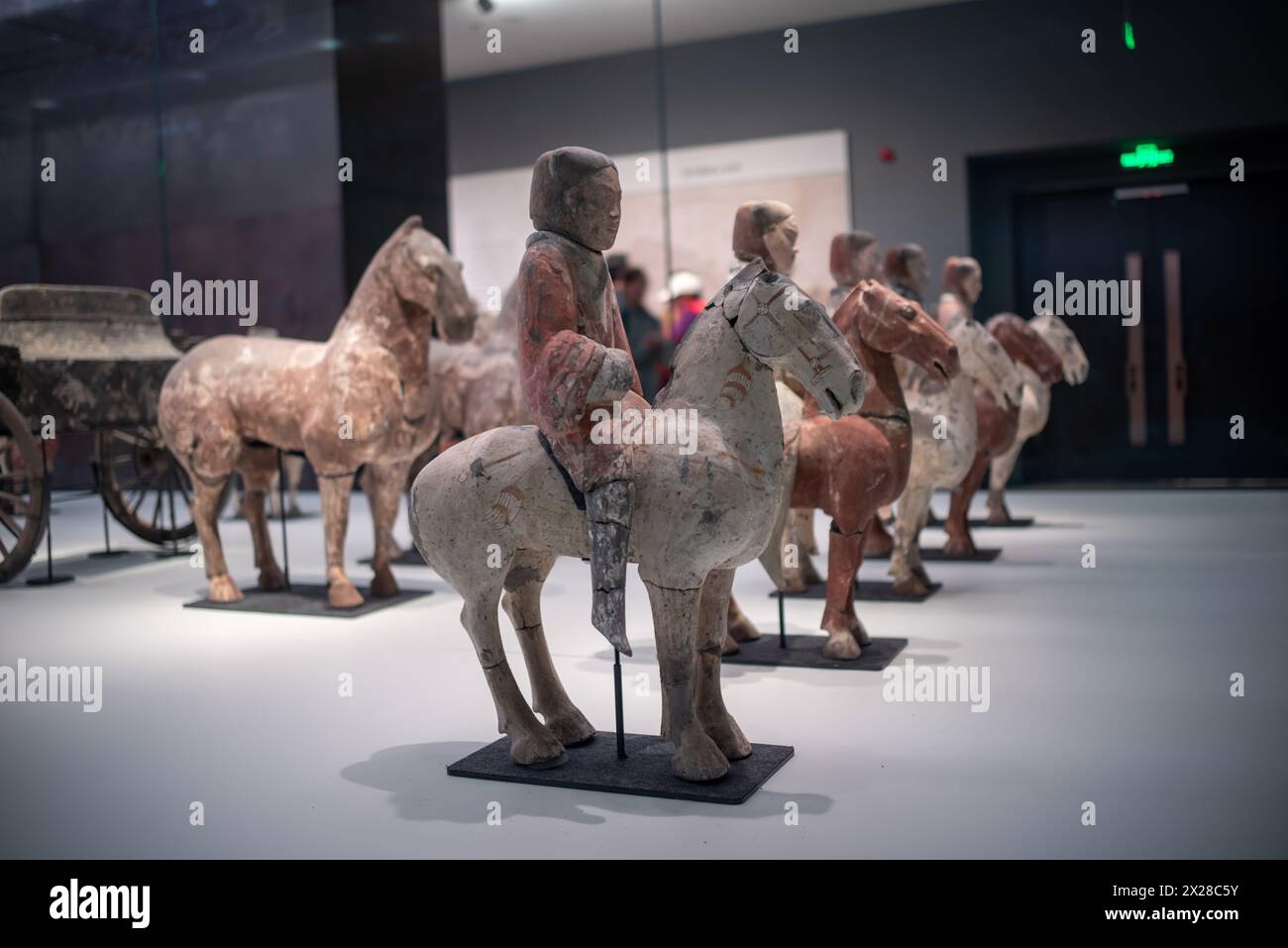 Qingdao,Shandong,China-Apr.18.2024:Painted pottery figurine array,Existing in Qingzhou Museum, Shandong Stock Photo