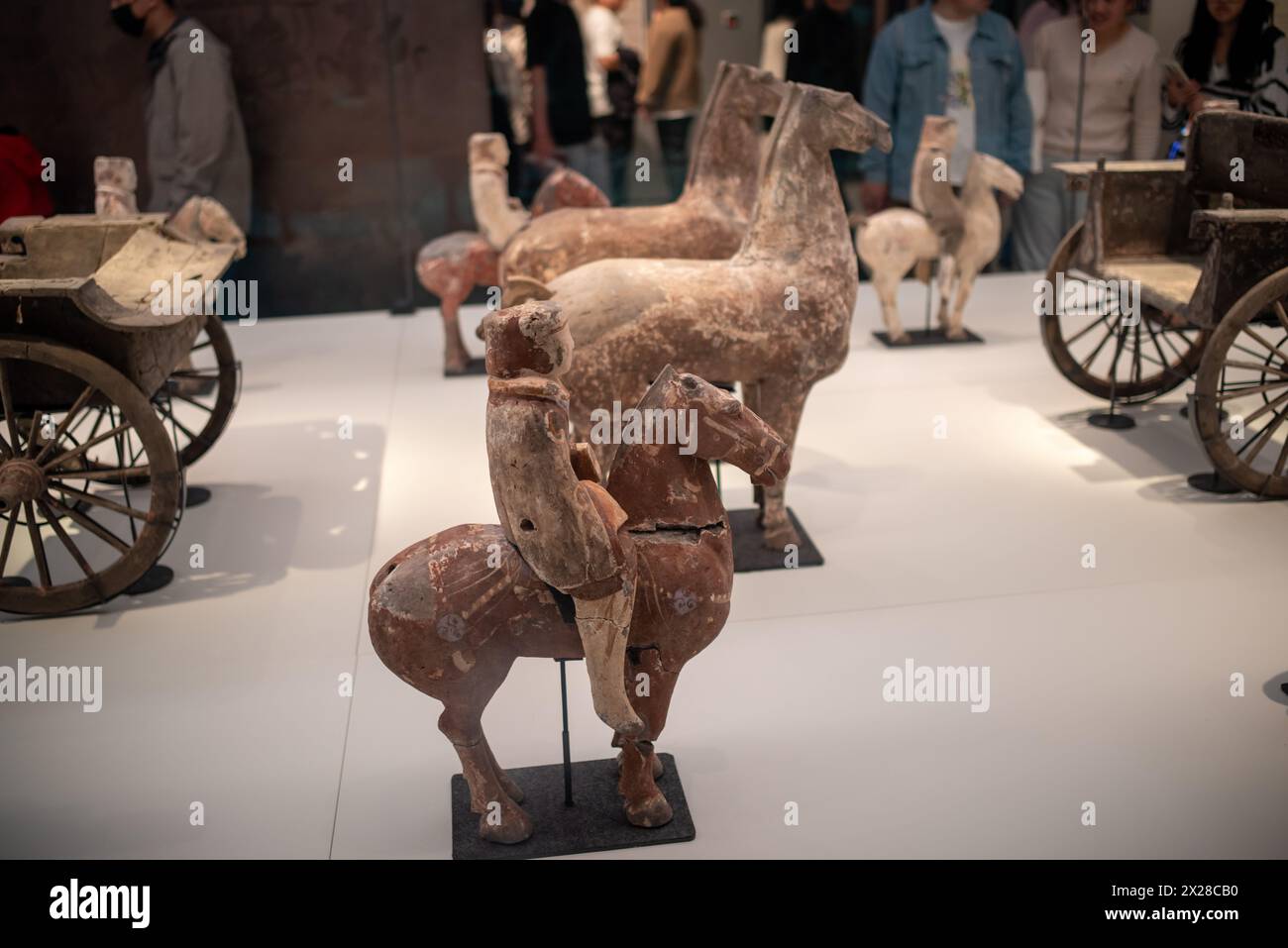 Qingdao,Shandong,China-Apr.18.2024:Painted pottery figurine array,Existing in Qingzhou Museum, Shandong Stock Photo