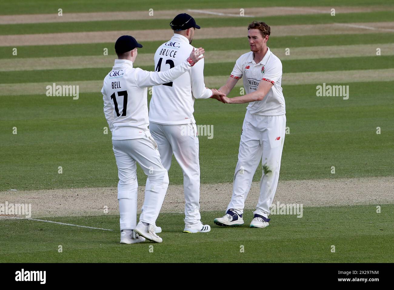 George Balderson of Lancashire celebrates with his team mates after taking the wicket of Noah Thain during Essex CCC vs Lancashire CCC, Vitality Count Stock Photo
