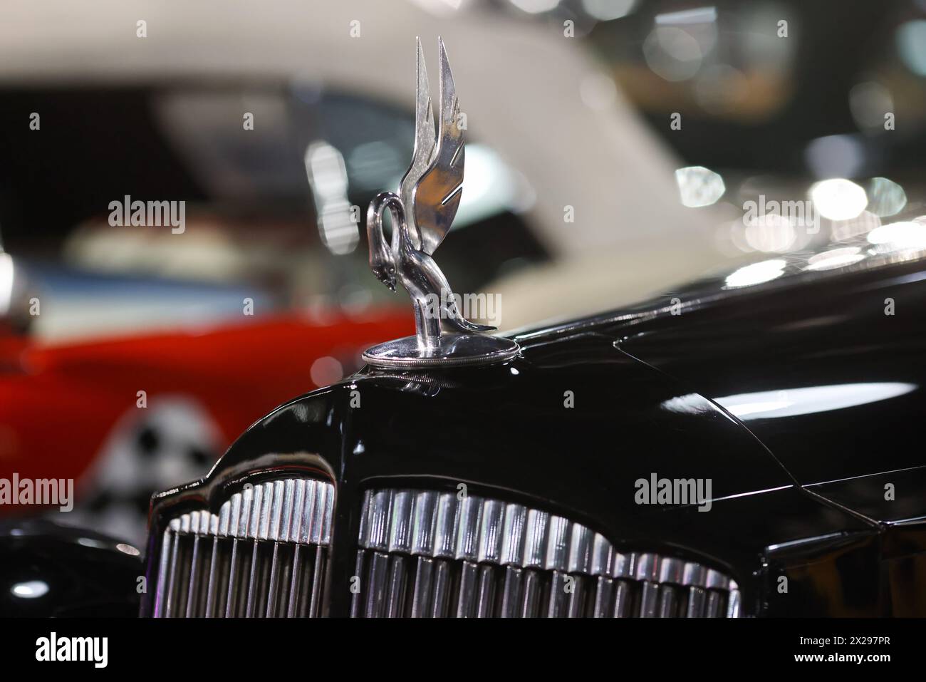 Bucharest, Romania - April 21, 2024: Details with the front part and emblem of a retro 1936 Packard 14th Series Super Eight Coupe Roadster retro car. Stock Photo