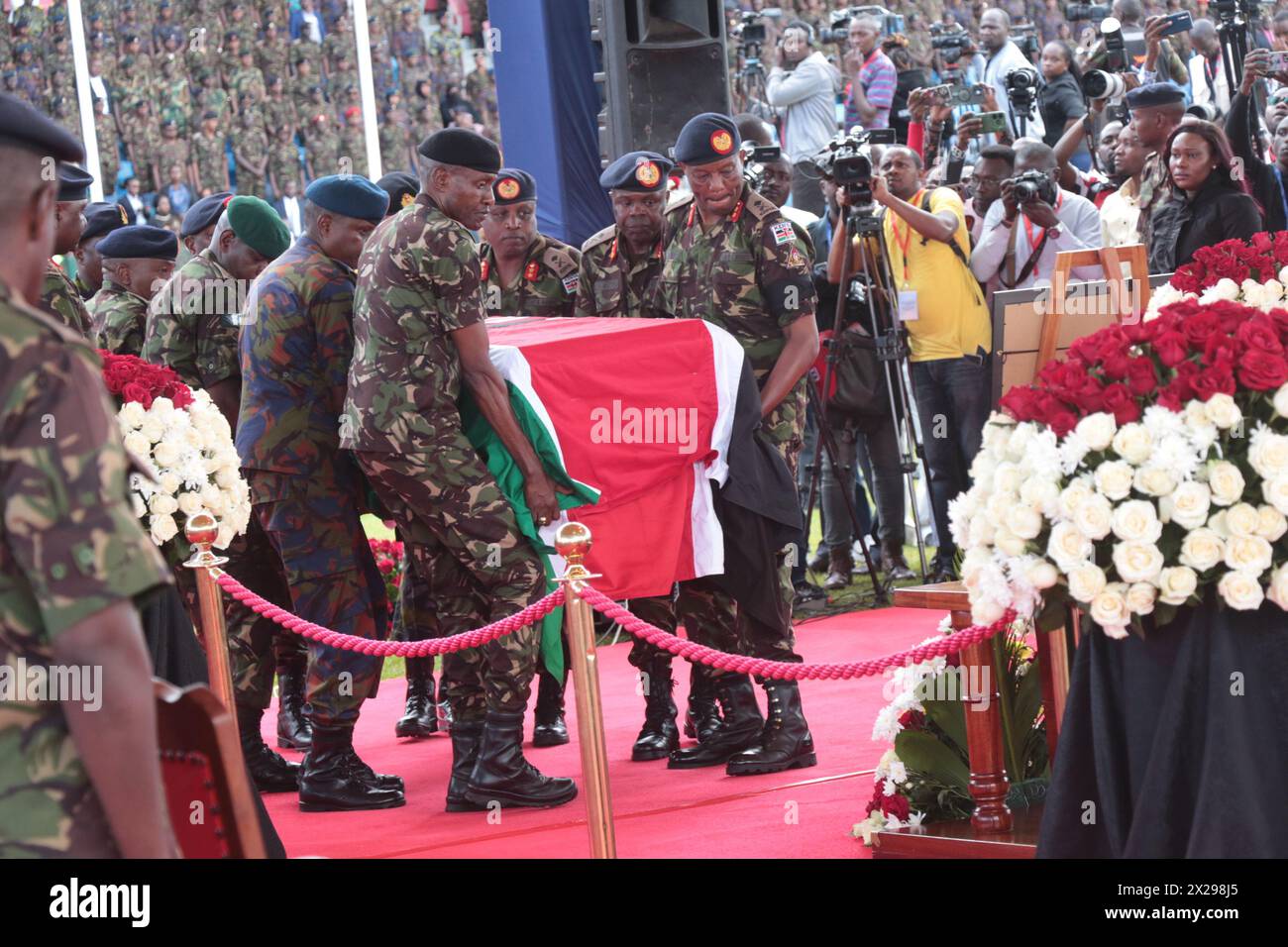 Nairobi, Kenya. 20th Apr, 2024. Kenya Defence Forces officers escort the coffin of the Chief of the Kenyan Defense Forces General Francis Ogolla during the farewell service at Nyayo National Stadium in Nairobi, Kenya, on April 20, 2024. Ten senior commanders, including chief of the Kenya Defense Forces Francis Ogolla, were killed in a helicopter crash in northwestern Kenya on Thursday. Credit: Allan Mutiso/Xinhua/Alamy Live News Stock Photo