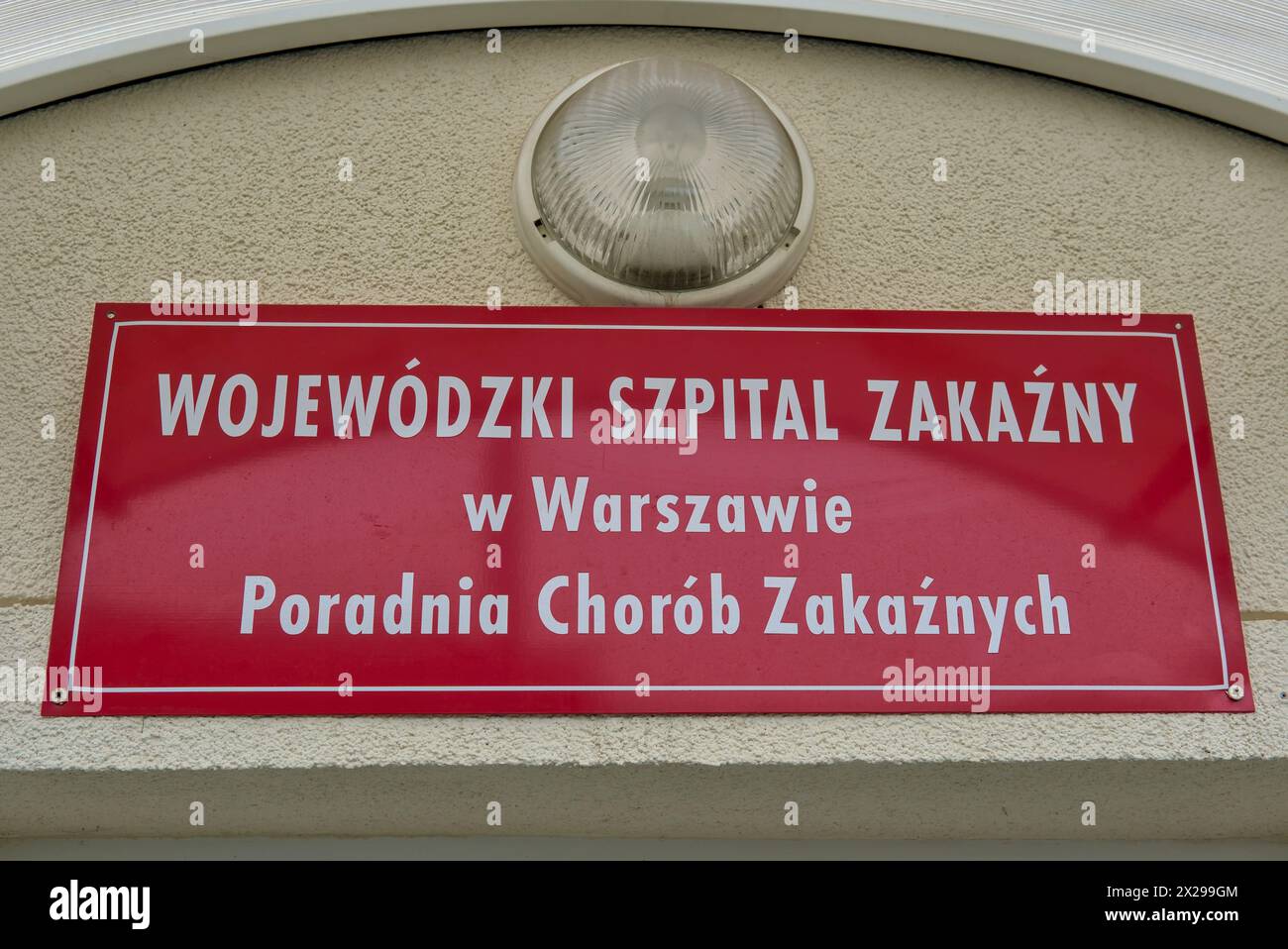 Voivodeship Infectious Disease Hospital in Warsaw, Infectious Diseases Outpatient Clinic, sign above the entrance Stock Photo