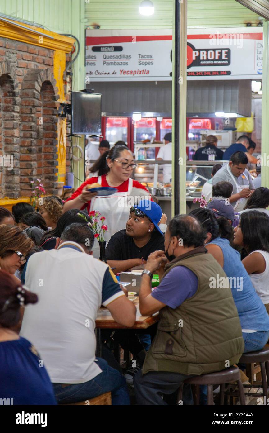 Restaurants inside Hall of Jamaica Market in Mexico City, Mexico Stock Photo